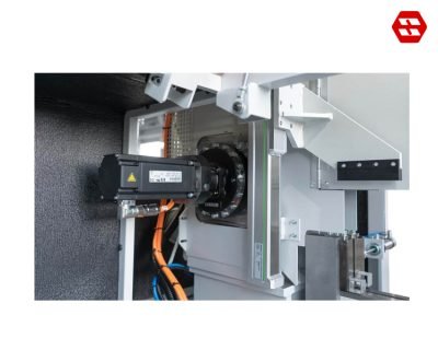 Saw feed with servo rocker arm